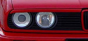 BMW 3 E30 - Apdaila ant žibintų (kompl).
