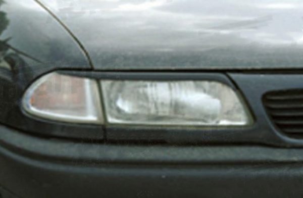 Opel Astra F - Apdaila ant žibintų (kompl) ver.II 1994-2002m.
